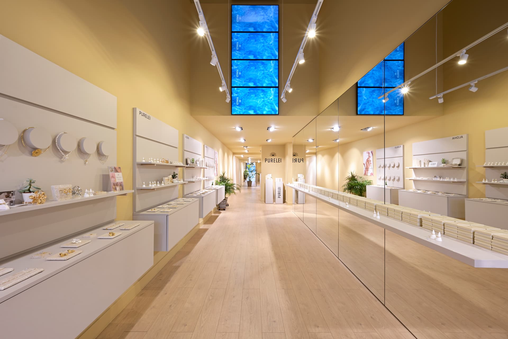 After - PURELEI main retail axis transformed from fit-out shell to finished store interior