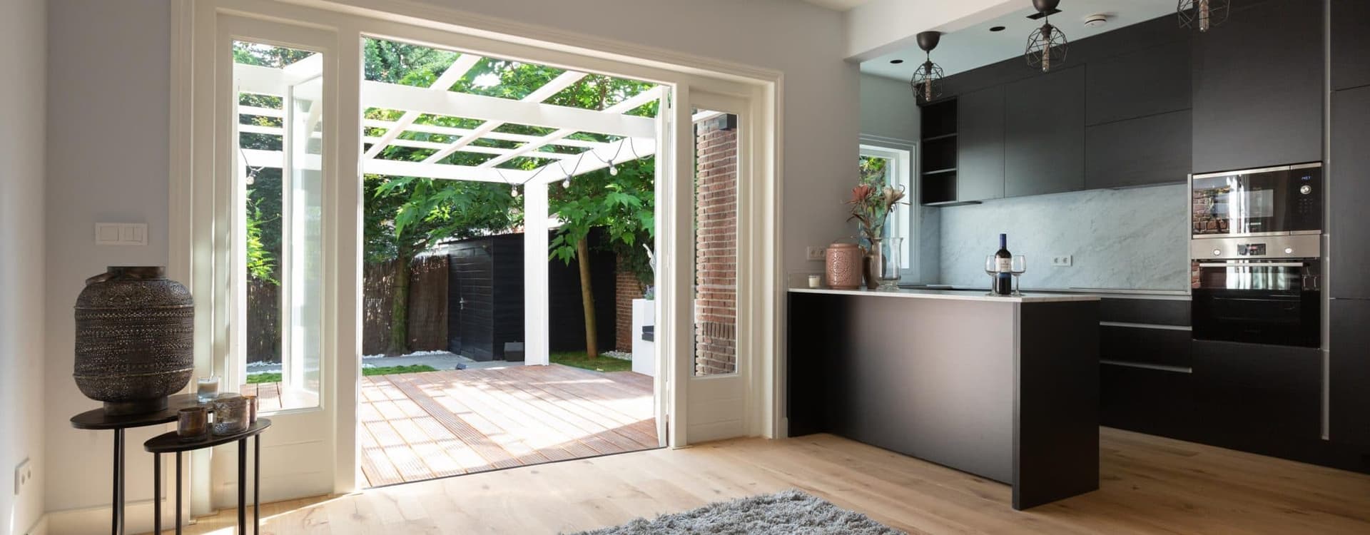 Renovated interior opening onto a garden